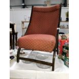 A mahogany framed nursing chair