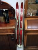 A vintage set of Finnish skis marked 'Esko Jarvinen Oy'