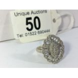 A 9ct white gold ring set diamonds, (one stone missing)