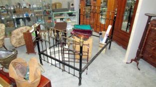 A Victorian brass and iron bed stead