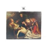 An oil on panel with label on reverse that reads 'Rembrandt, Our Saviour being taken down from the