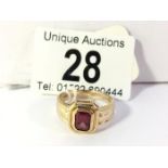 A 9ct gold ring set garnet, approx. 4g, size R