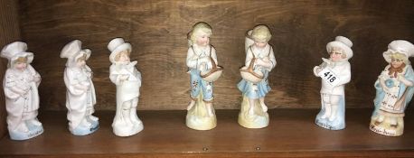 3 pairs of Victorian figures and an odd one
