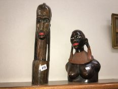 2 carved African busts