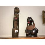 2 carved African busts