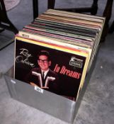 A box of 100 LP records including Roy Orbison, Jimmie Rogers, Chuck Berry etc