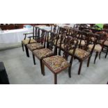 A set of 8 Regency style mahogany dining chairs
