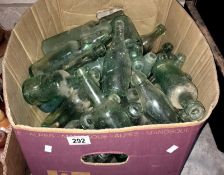 A box of vintage glass bottles