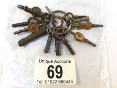 A quantity of pocket watch keys