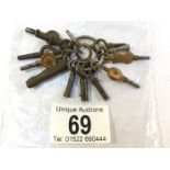 A quantity of pocket watch keys