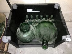 A box of vintage glass bottles