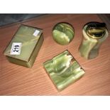 An onyx cigarette box, onyx lighter and 2 other onyx items