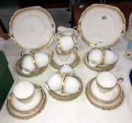 Approximately 40 pieces of gold decorated tea ware