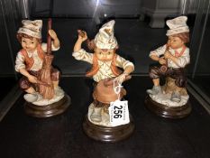 3 bisque figures of children