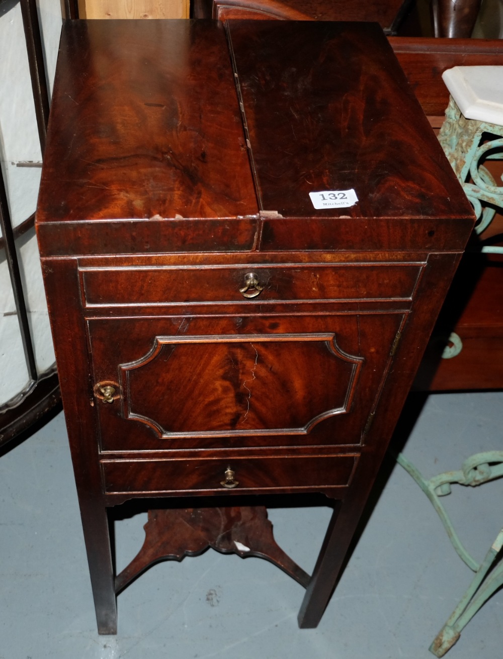 19thC Mahogany Wash Stand, the hinged fold out top over a cabinet and a drawer, with stretcher