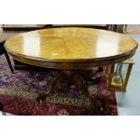 Victorian Oval Walnut Centre Table, on central pod with 4 splayed legs, porcelain castors, 54”w