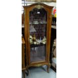 French Kingwood Display Cabinet, with gilt mounts, the single arched glass door mtd with figure of