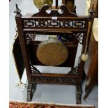 Brass Gong in carved walnut Stand, with striker, 40”h