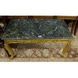 Carved Gilt Wood Coffee Table, with raised floral mouldings and green marble top, 35”w x 20”d.