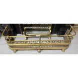 Victorian brass fender, the top rail over pierced front panel on 3 paw feet, 43”w x 13”h