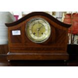 Inlaid Mahogany Mantle Clock with brass mounted circular dial, on 4 brass bun feet, working