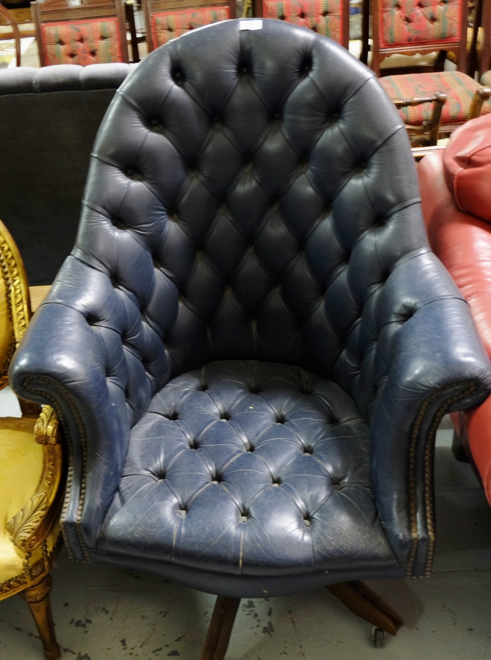 Swivel Office Chair, blue leather upholstery, button back.