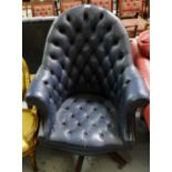 Swivel Office Chair, blue leather upholstery, button back.