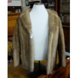 Lady’s Mink Fur Jacket, size 10 approx, back 28” long, sleeves 24”long.