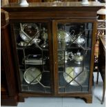 Edw. Inlaid mahogany Floor Bookcase, two glazed doors over bracket feet, 46.5”h x 38.5”w.