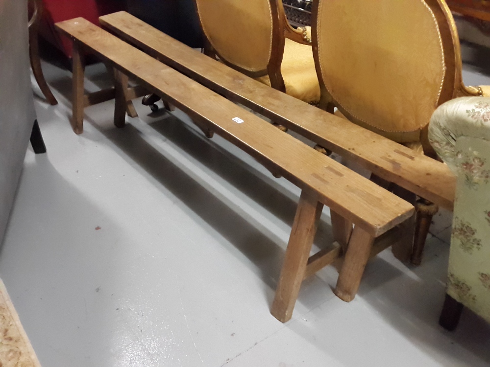 Matching Pair of Late 19thC Pine Forms, on A-shaped end stretchers, each 79”long.