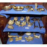 3 shelves of miniature brass ornaments, mainly animals incl. pair of frogs, swan, crocodile, keys