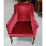 Edwardian Armchair, covered in red velvet fabric, on tapered and inlaid legs, cup castors