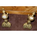 Matching Pair of Brass Fire Dogs, with ball shaped finials over ribbon bases, each 16”h