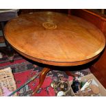 Oval Walnut Loo Table, with central satin oval inlay, 46”w x 33”d, on tripod pad feet.