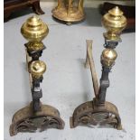 Matching Pair of heavy large Cast Iron Fire Dogs, with brass finials and dome shaped front supports,