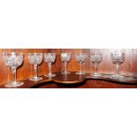 Set of 7 Cut Glass Wine Glasses, on stems, diamond cut.