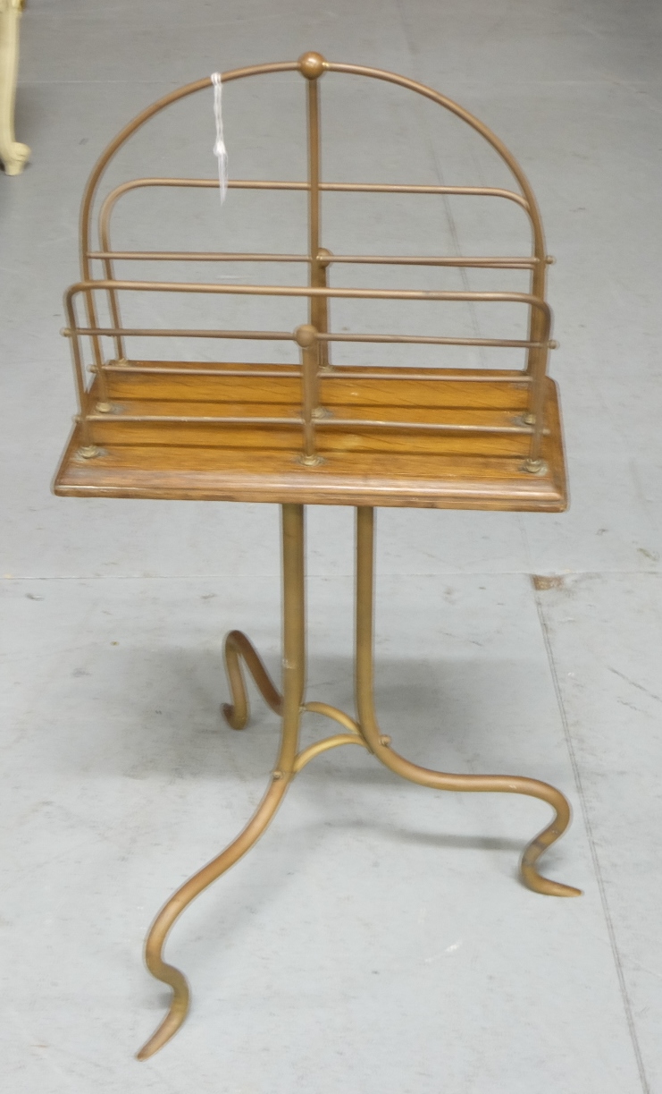 19thC Brass Magazine Stand, with oak shelf, on brass tripod legs.