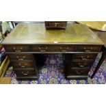 19thC Kneehole Mahogany Writing Desk, the central drawer with 4 drawers on either side, tooled green