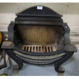 Cast Iron Fire Grate, Regency Style, with a raised back and bow front, on c-scrolled feet, 21”w x