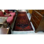 Red ground Persian floor runner, full pile, various triangular patterns 300cm x 110cm