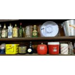 Two shelves of bar related items – Schweppes, Cork Gin etc ice buckets etc