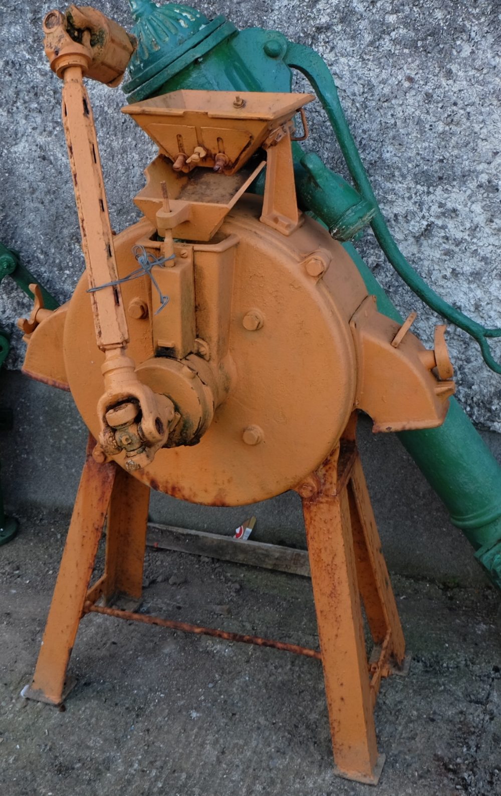 Cast Iron Corn Grinder, stamped Denmark, painted orange