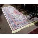 Kashmir Floor Rug (as new), beige ground with central medallion and multiple red patterns, 150cm x