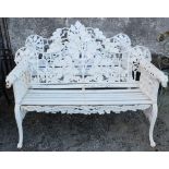 Matching Pair of Cast Iron Garden Seats, with pierced backs, mounted with dog heads at arms, 58”w