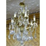 Ornate Brass Framed French light fitting, with tiered cut glass droplets, 6 electric branches