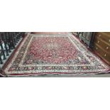 Large red ground Persian Krishan Floor Carpet with central medallion design and multiple patterned