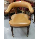 19thC mahogany framed Library Armchair, with brown leatherette covered seat and padded bow arms,