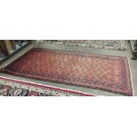 Afghan Baluchi Red Ground Floor Rug, 125cm x 255cm