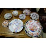 Selection of oriental ceramics – side plates, jar lids, Chinese teacup with lid and saucer