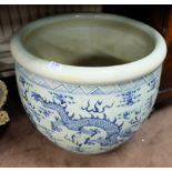 Large Porcelain Blue & White Jardinere, decorated in a continual pattern of Chinese Dragons, 22” dia